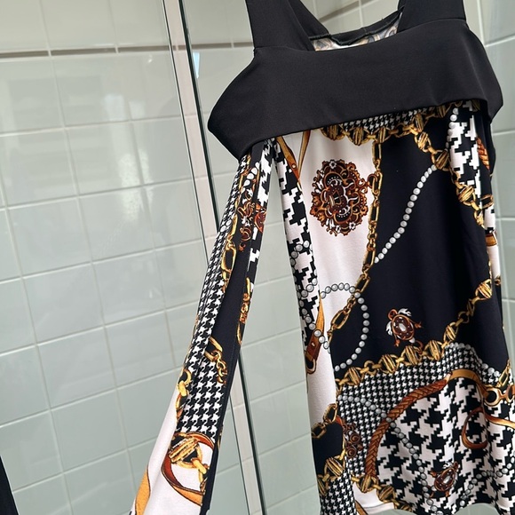 Joseph Ribkoff tunic with cut out shoulders. - Picture 2 of 3